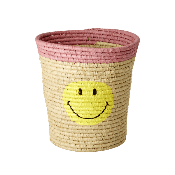 Round raffia basket with smiley motif